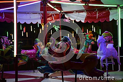 BANGKOK, THAILAND â€“ NOVEMBER 22, 2018: a forsake carousel nobody in the night festival Editorial Stock Photo